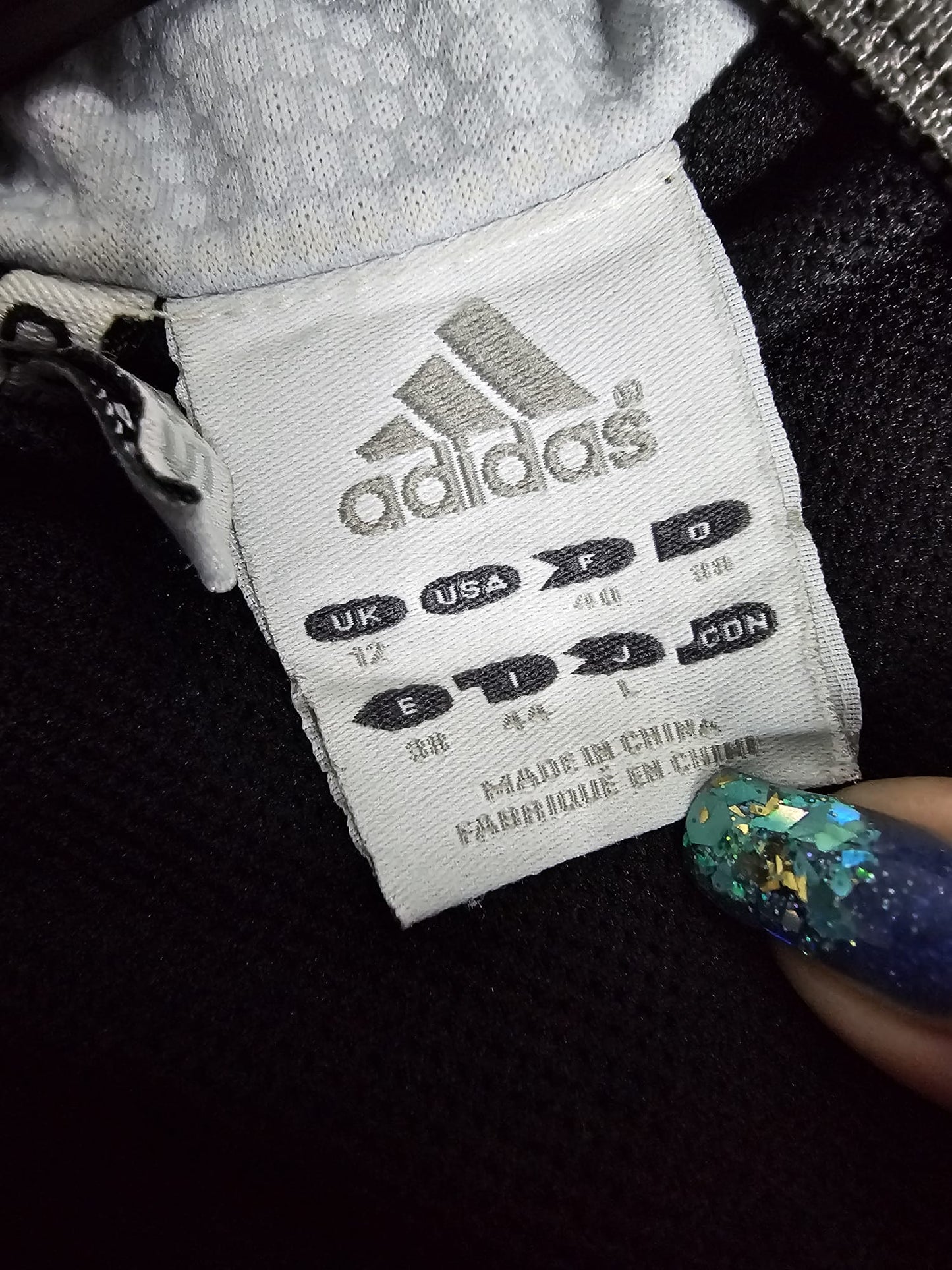 Adidas women’s track zip up top